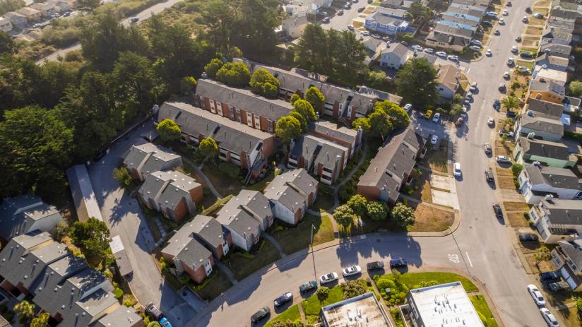 Aerial view of a community of multifamily homes.