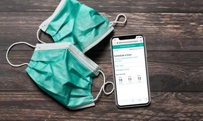 Face masks and cellphone on desk 