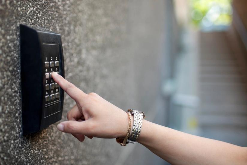 Resident uses a keypad to enter an access point.