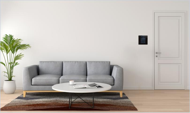 apartment living room with smart devices on display