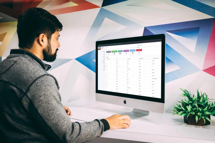 Property manager views parking information in the desktop version of the SmartRent Management App.