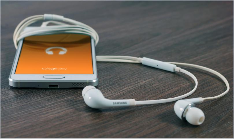 smartphone with podcast playing on screen
